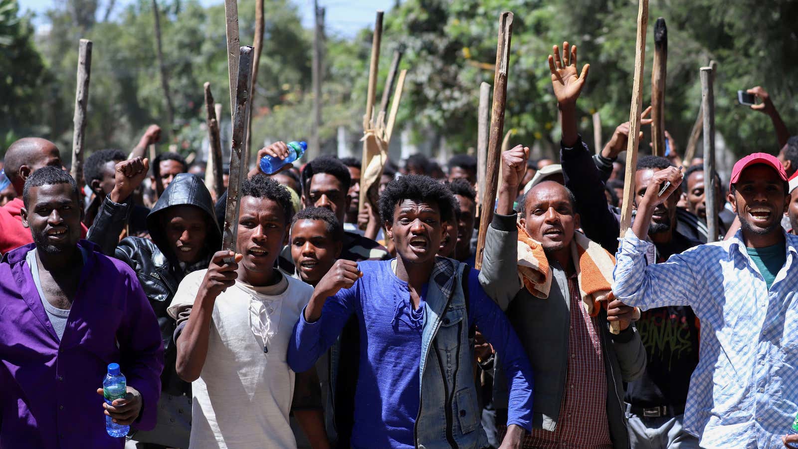 Oromo youth chant slogans during a protest in-front of Jawar Mohammed’s house, an Oromo activist and leader of the Oromo protest in Addis Ababa, Ethiopia, October 24, 2019.
