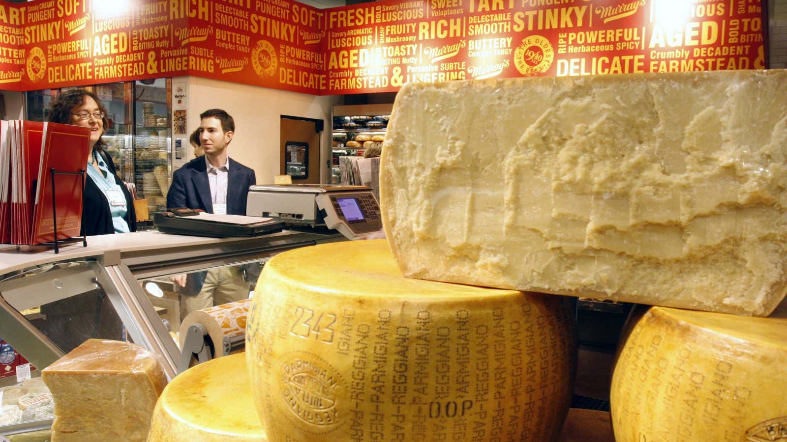 Vendors and members of the media look over Murray’s Cheese from New York, a specialty cheese shop inside Kroger’s Fresh Fare store, Monday, Nov. 17,…