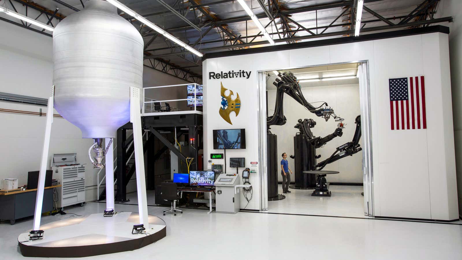 Relativity’s additive manufacturing workshop, with CEO for scale.