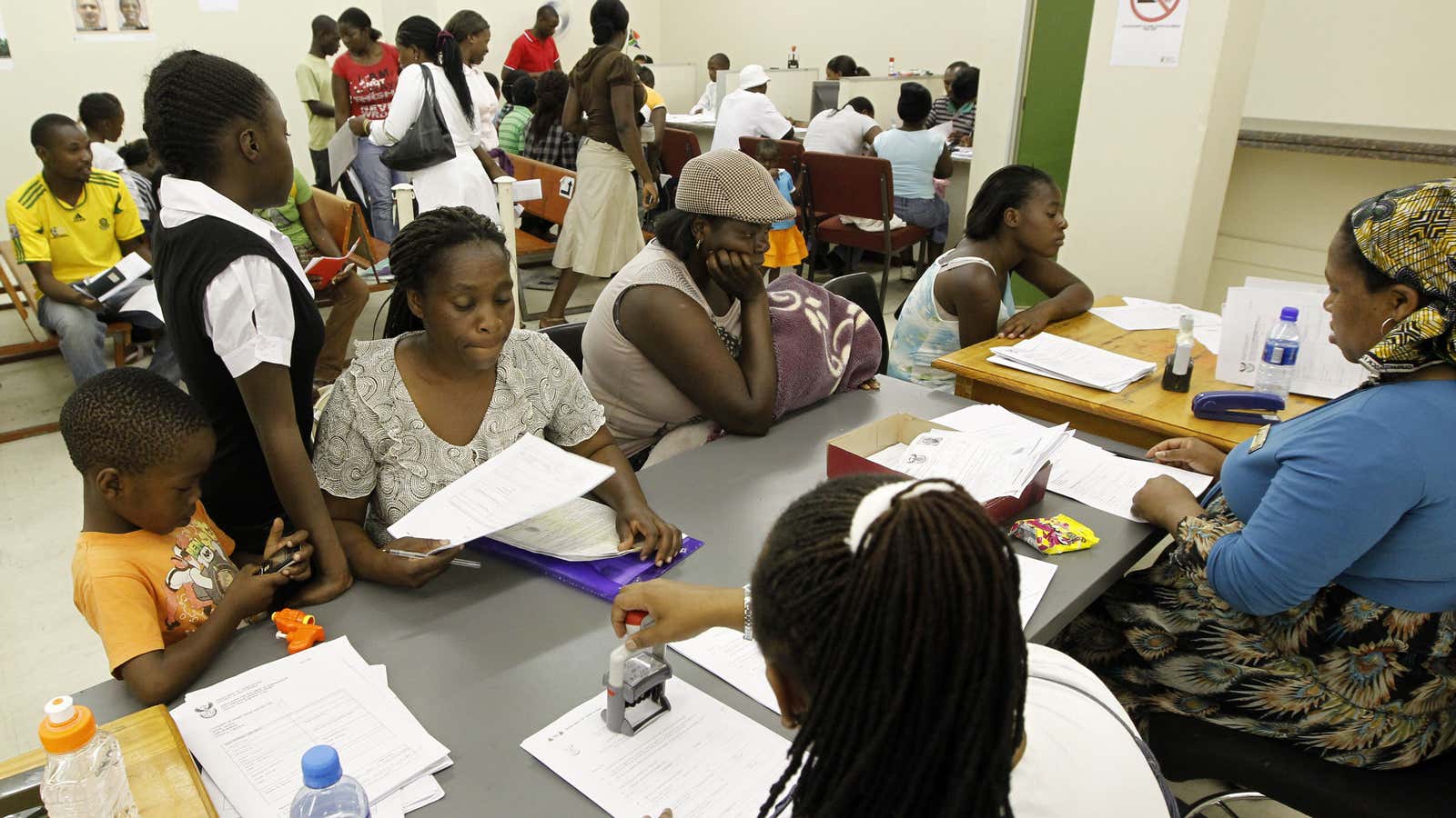 Zimbabweans being processed for residence permits in South Africa.
