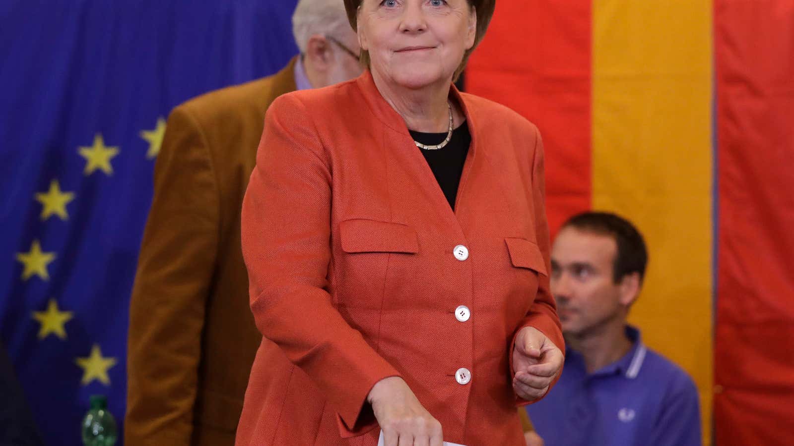 Merkel marches to victory