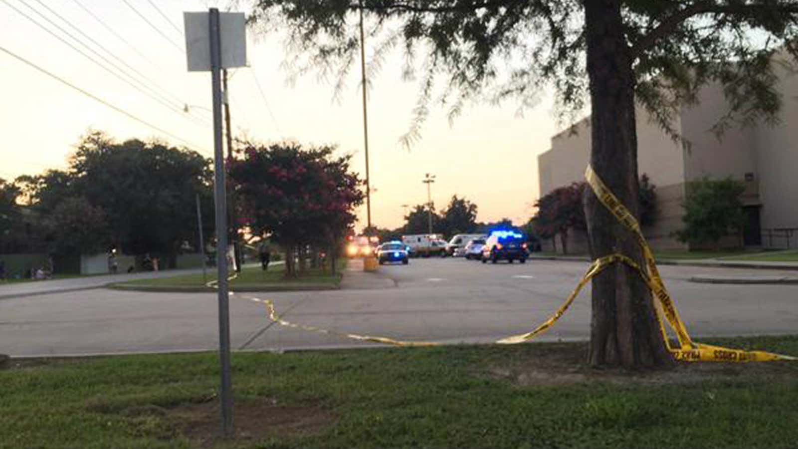 Police tape surrounds the scene following a shooting at a movie theater Thursday, July 23, 2015, in Lafayette, La