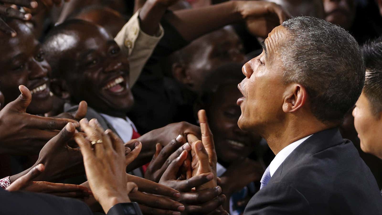 Obama greets a crowd after giving a speech in Nairobi.