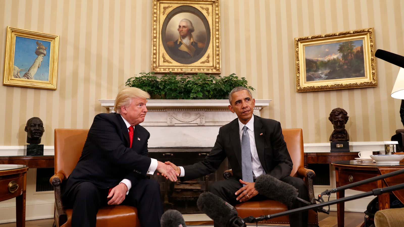President Barack Obama shakes hands with President-elect Donald Trump in the Oval Office.