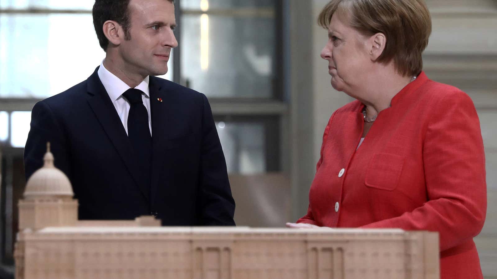 Merkel’s about to curb Macron’s enthusiasm