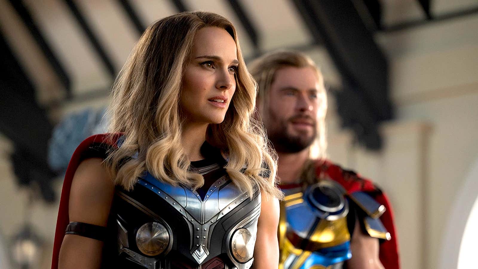 Natalie Portman and Chris Hemsworth in a scene from “Thor: Love and Thunder”