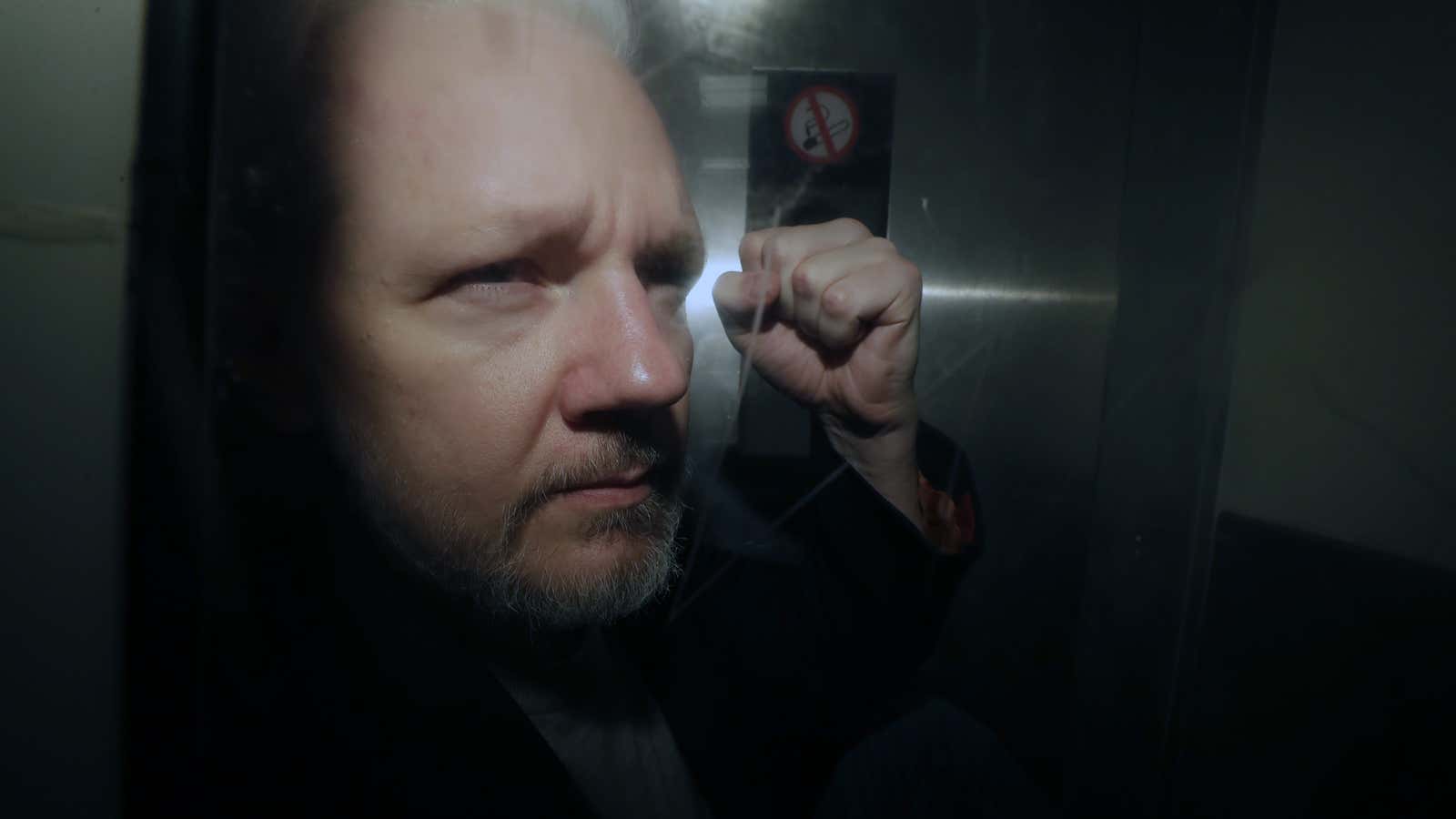 Assange leaves court in London earlier this month.