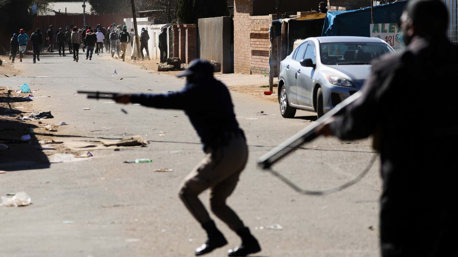 Police fire at protesters during unrest linked to the jailing of former President Jacob Zuma, in Soweto
