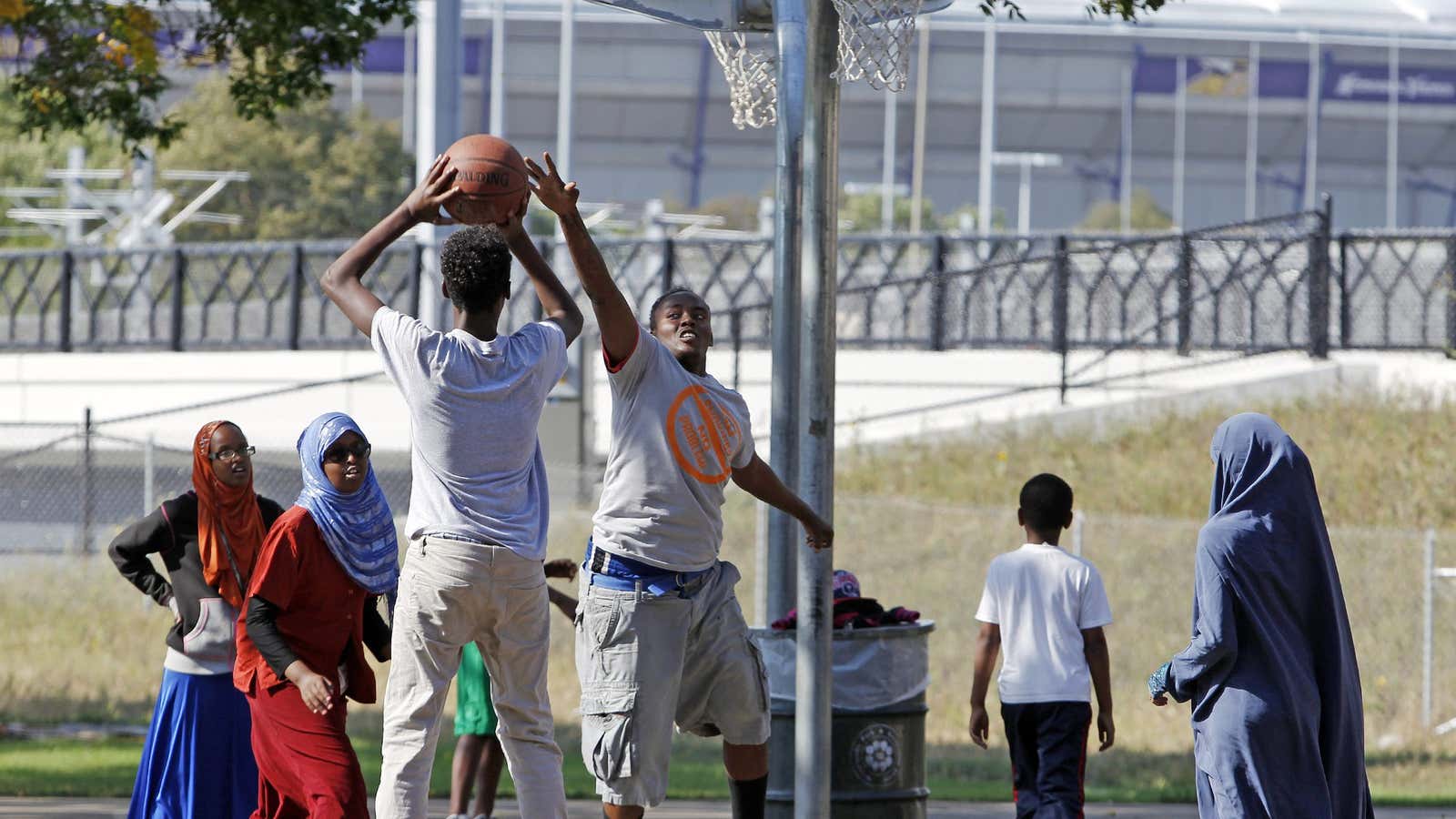 Somali youths playing basketball  in Minneapolis