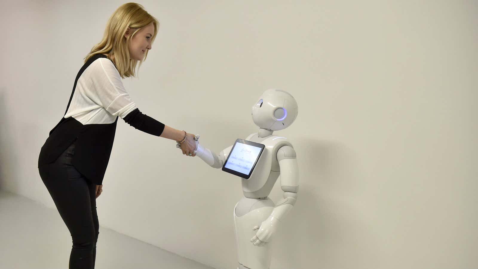 Experts predict humans will do more than shake hands with robots.