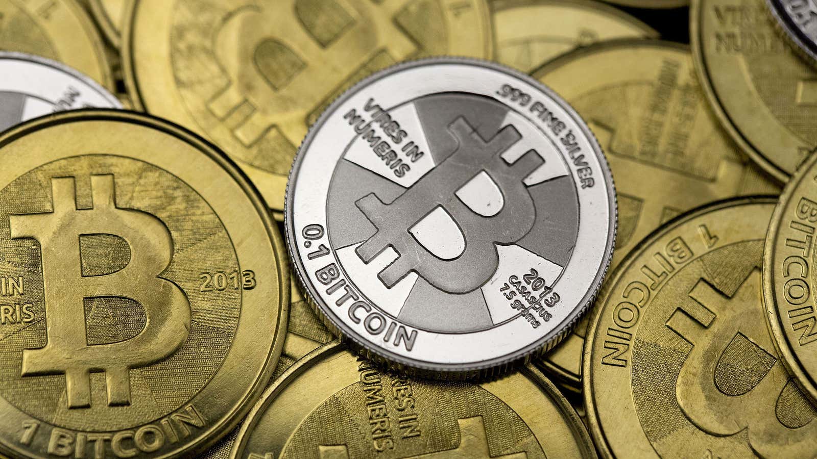 Some of Bitcoin enthusiast Mike Caldwell’s coins are pictured at his office in this photo illustration in Sandy, Utah, January 31, 2014.