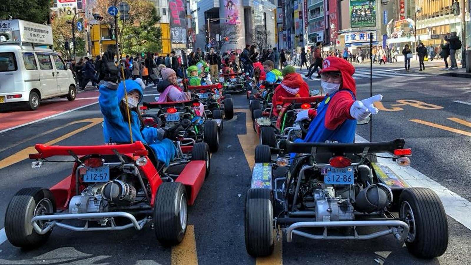 Mario Kart tours in Japan Foreigners dressed up as Mario and Luigi are