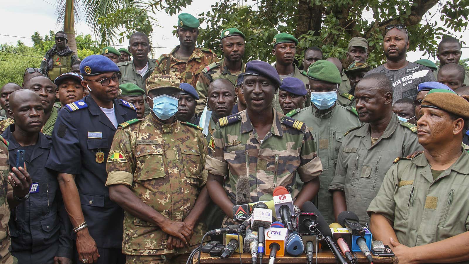 Colonel-Major Ismael Wague, centre, spokesman for the soldiers identifying themselves as National Committee for the Salvation of the People, speaks during a press conference at Camp Soudiata in Kati, Mali, Wednesday, Aug. 19, 2020