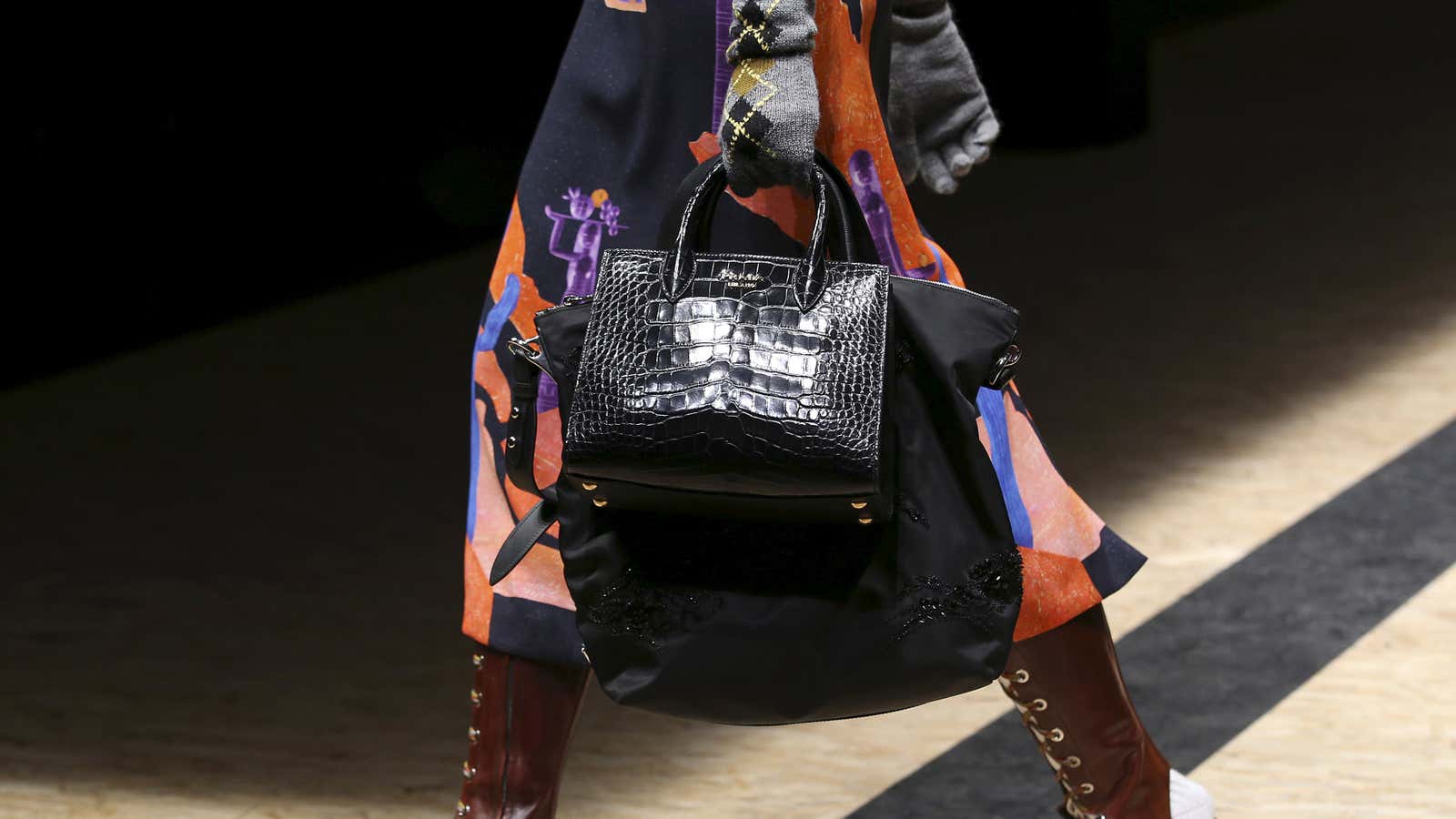 On Prada’s runway, the more bags the better.
