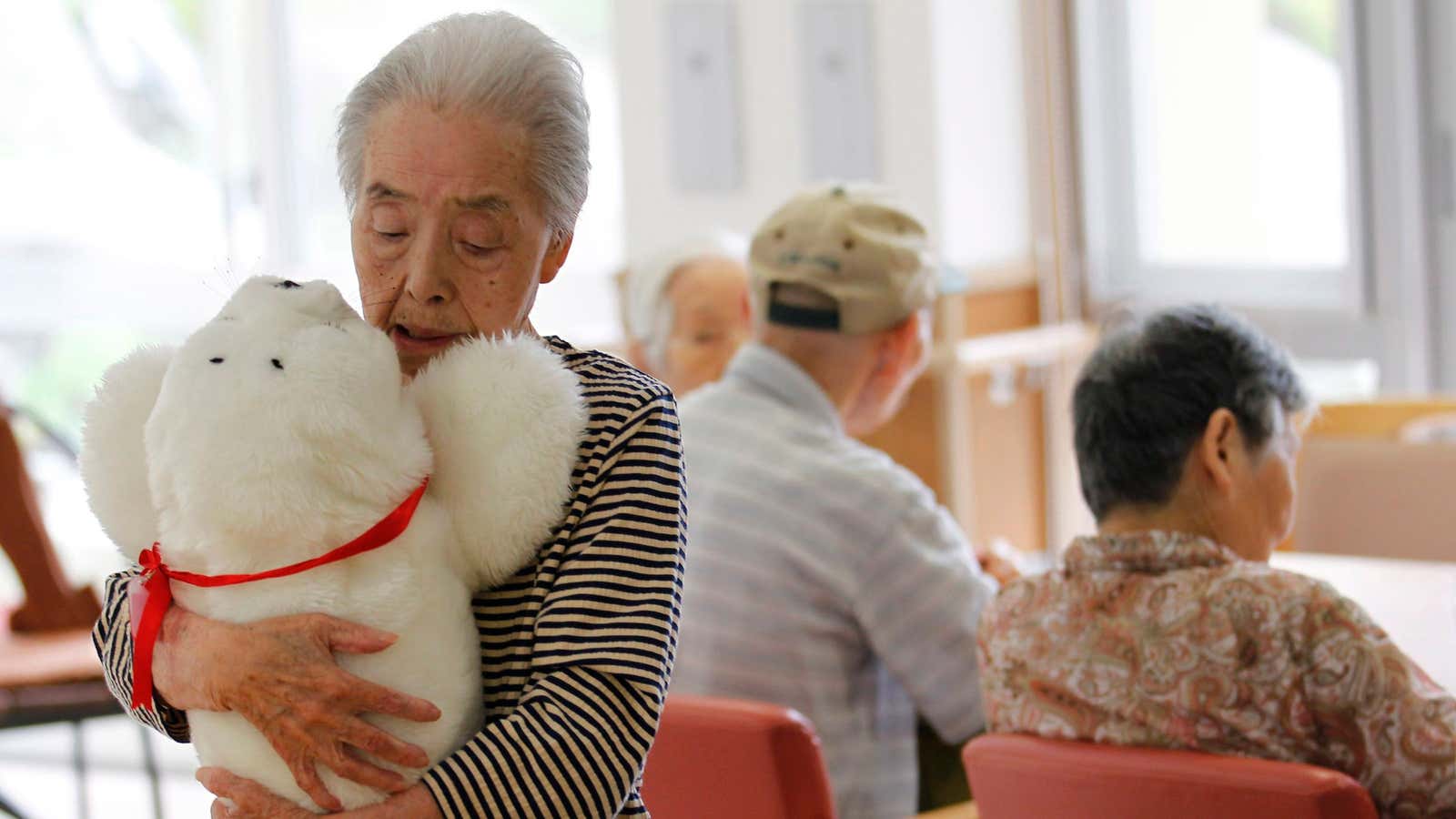 “Therapeutic robots” will compensate for the increasing lack of real people for the elderly to hug.
