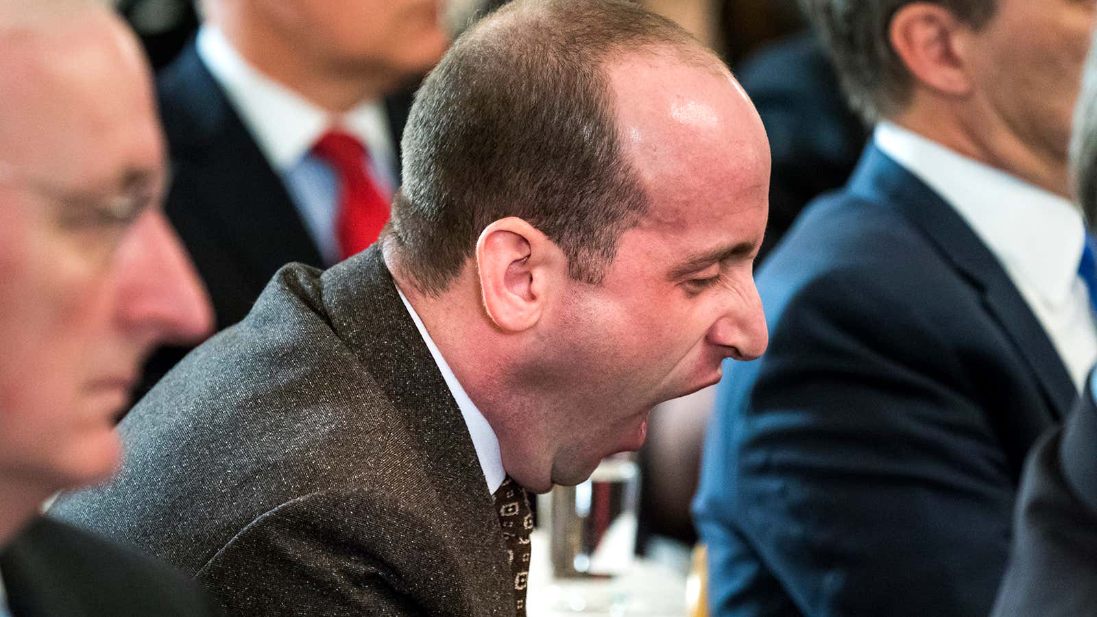 Stephen Miller, senior advisor for president Donald J. Trump, yawns as the president speaks about ways to combat mass shootings at high schools during a meeting with the nation’s governors in the State Dining Room of the White House.