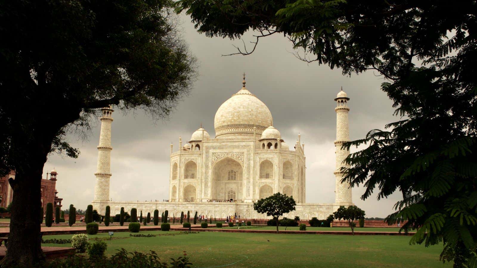 Tourists visit the Taj Mahal in the tourist city of Agra, September 16, 2004. India is preparing to celebrate the 350th anniversary of the Taj Mahal, the 17th century marble mausoleum built by Mughal emperor Shah Jahan for his wife, later in the month.