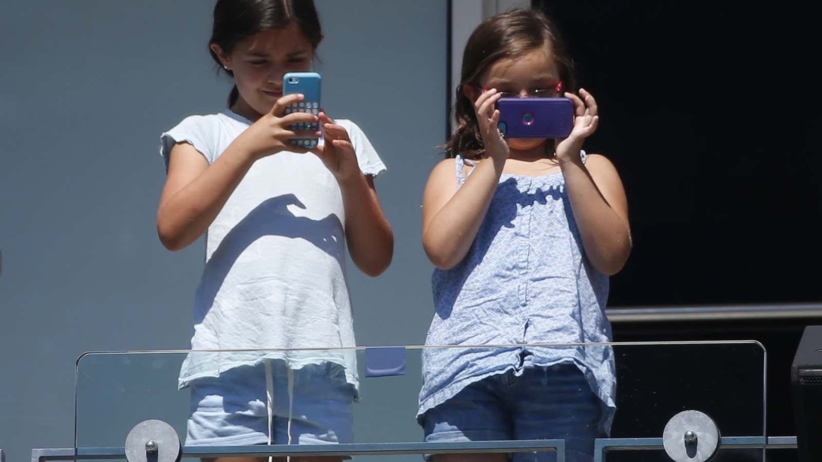 These little kids are probably managing their finances from their smartphones…or playing Candy Crush.