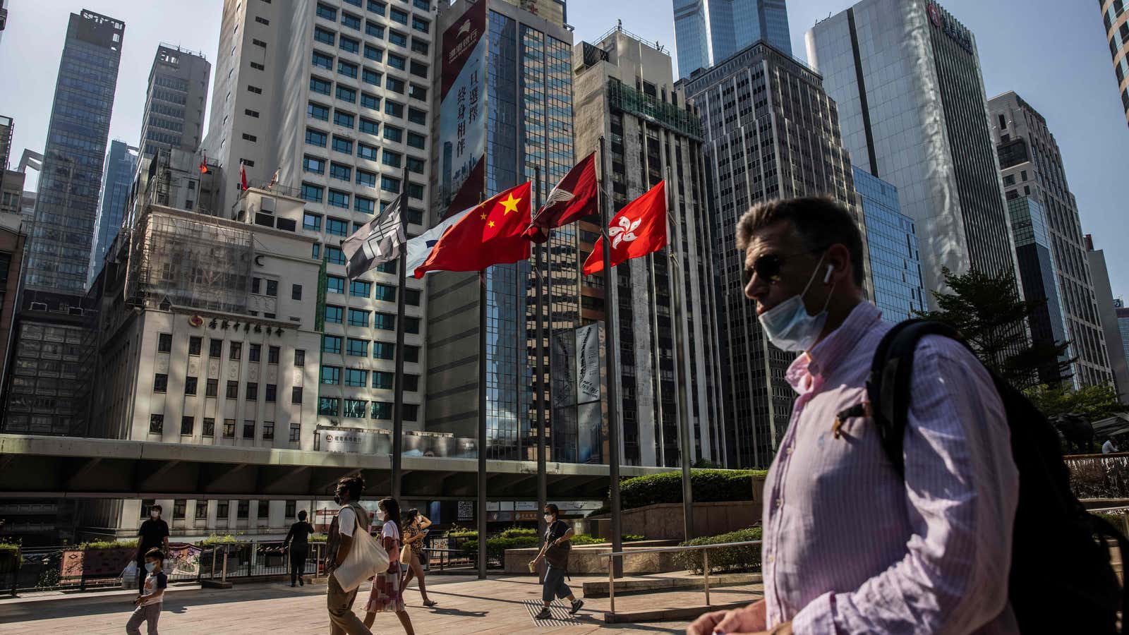 People walk through Exchange Square in Hong Kong on October 28, 2022.
