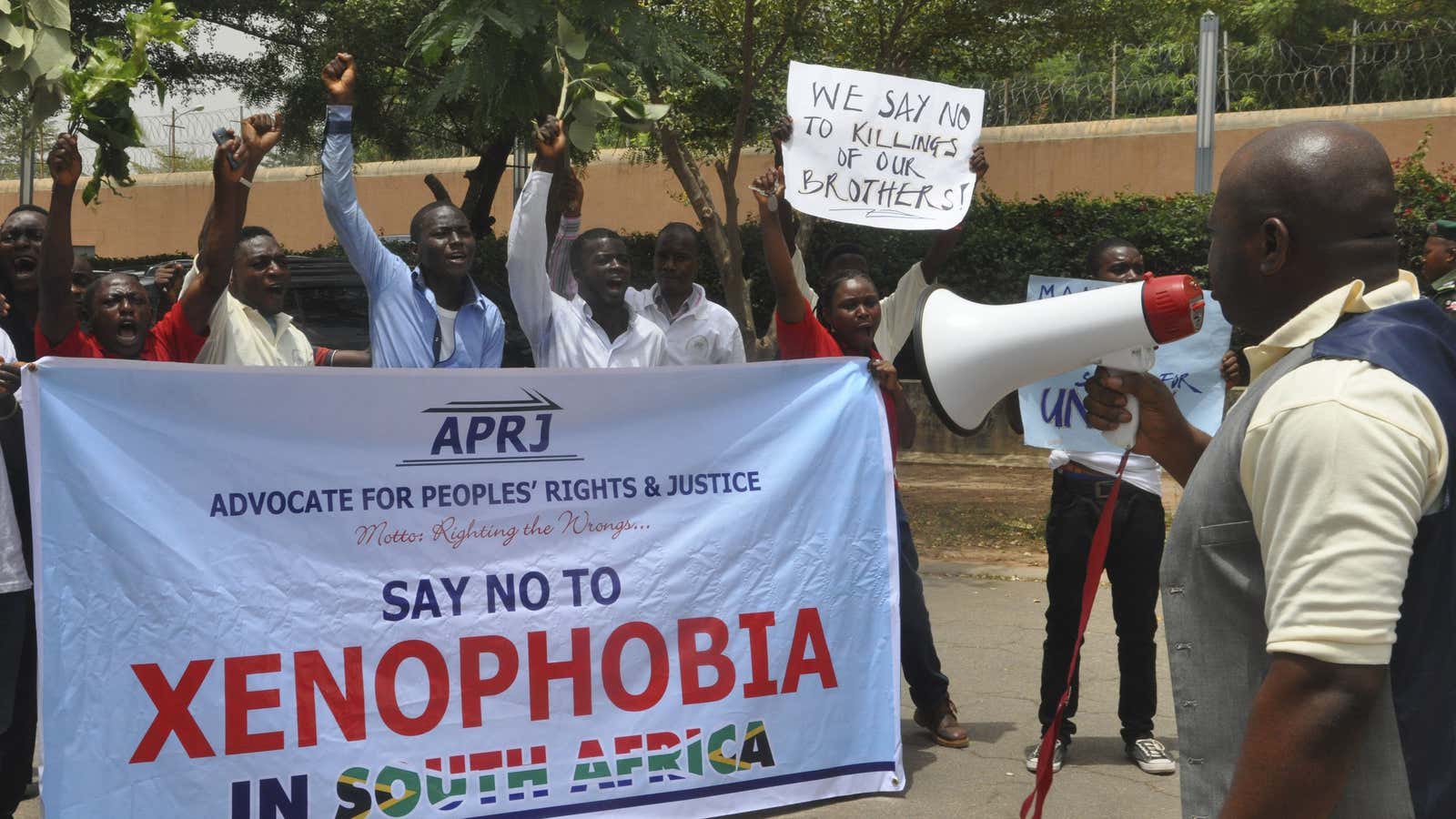 Nigerians protesting outside the South African embassy.