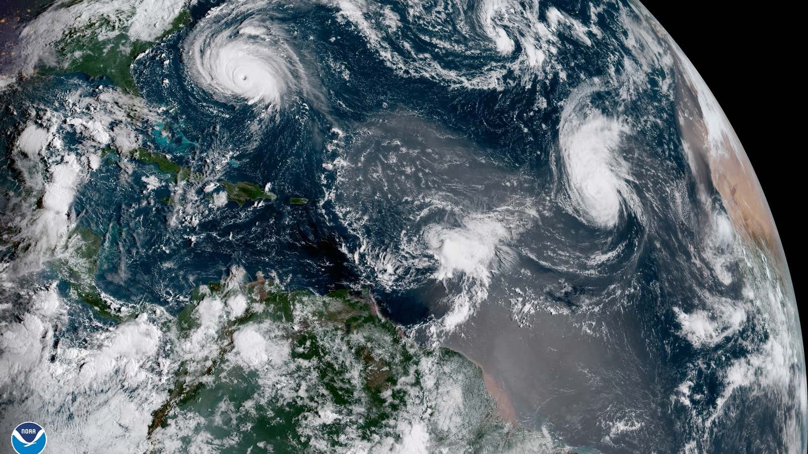 The view of the Atlantic on Sept. 12. Florence on the right, bearing close to the US coast, Tropical Storm Isaac near the Lesser Antilles, and Hurricane Helene off the coast of Africa.