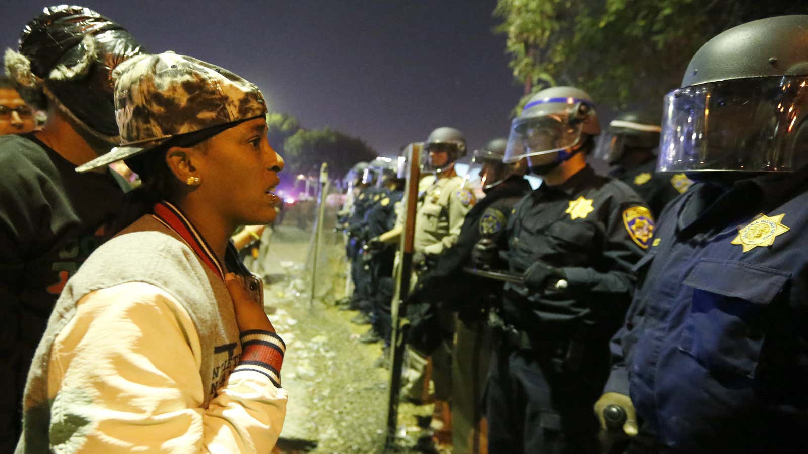 LAPD officers face protestors following the grand jury decision in the shooting of Michael Brown in Ferguson, Missouri.