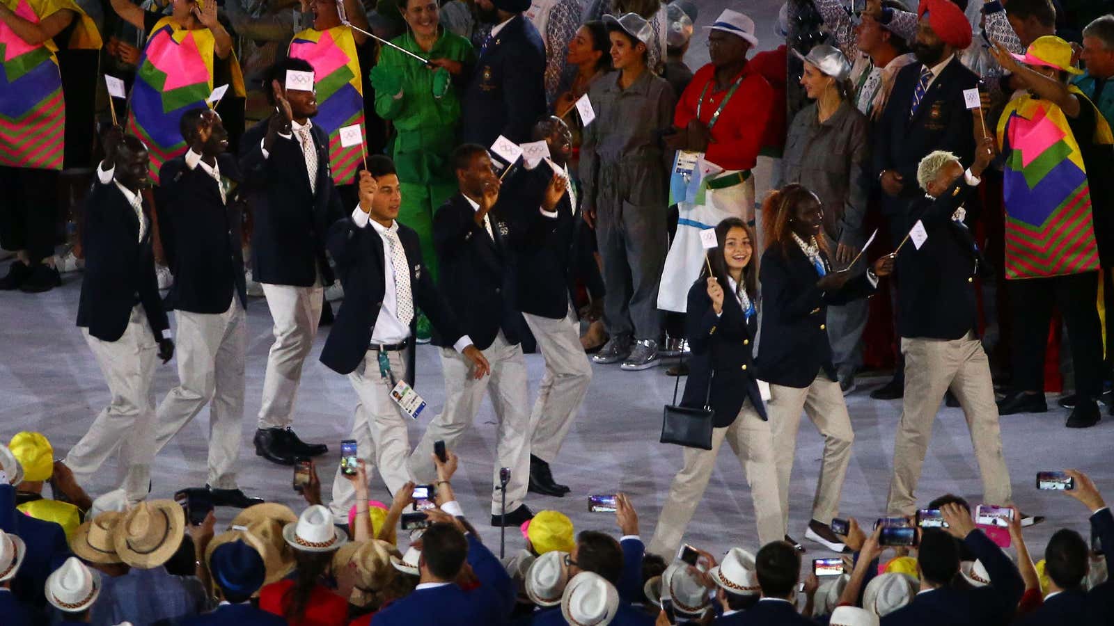 The Refugee Olympic Athletes’ team arrives for the opening ceremony.