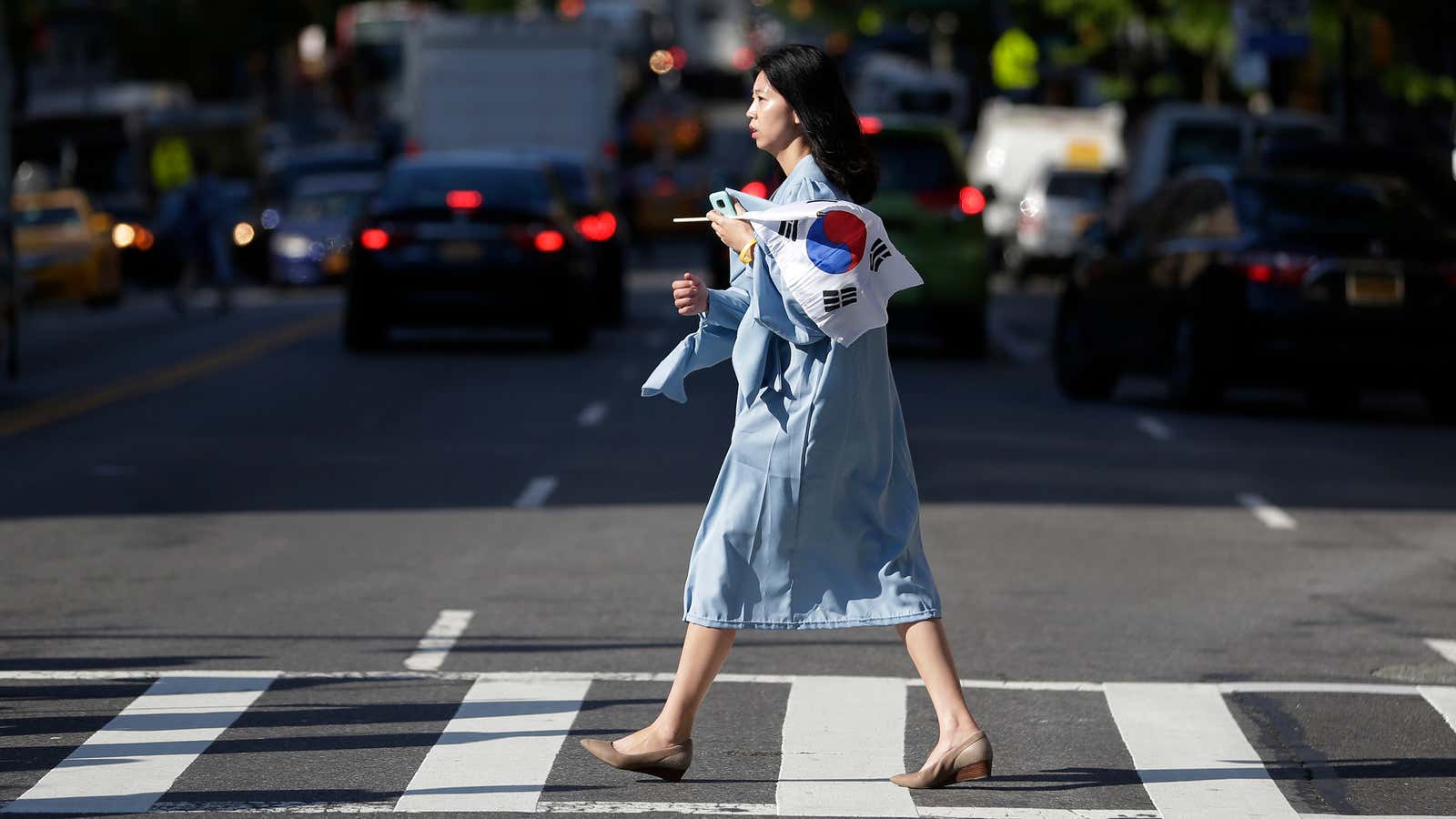 A student en route to a graduation ceremony at Columbia University.