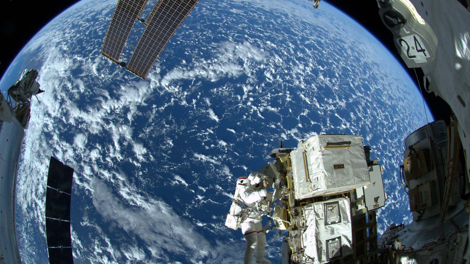 NASA astronaut  Reid Wiseman works outside the space station.