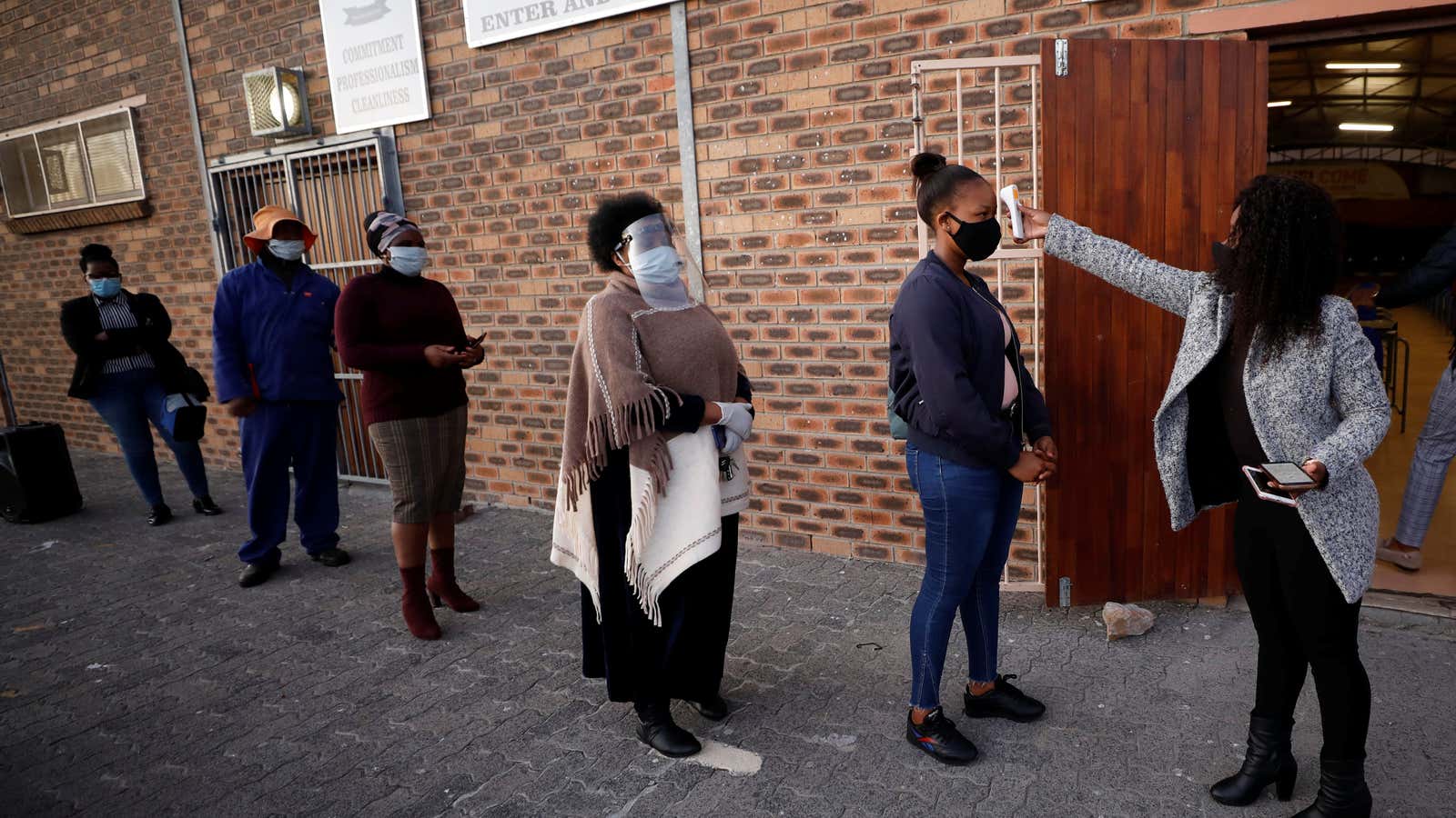 Social distancing, temperature checks, and masks in South African schools as the reopened after a strict lockdown in June