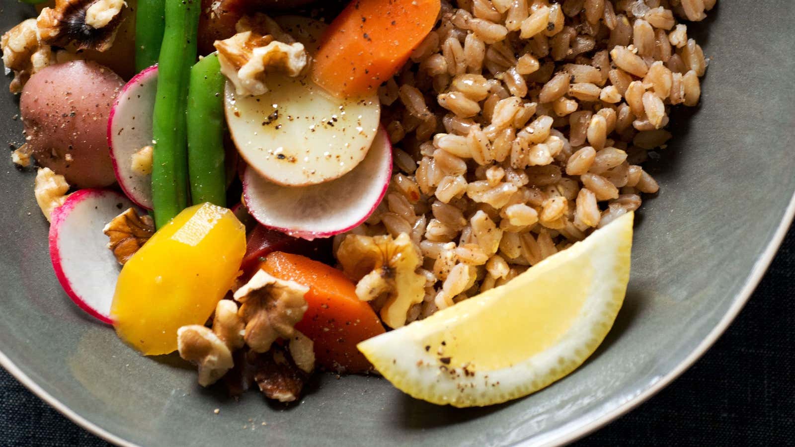 “Bowl” by Lukas Volger is full of beautiful meals like this farro and vegetable dish.