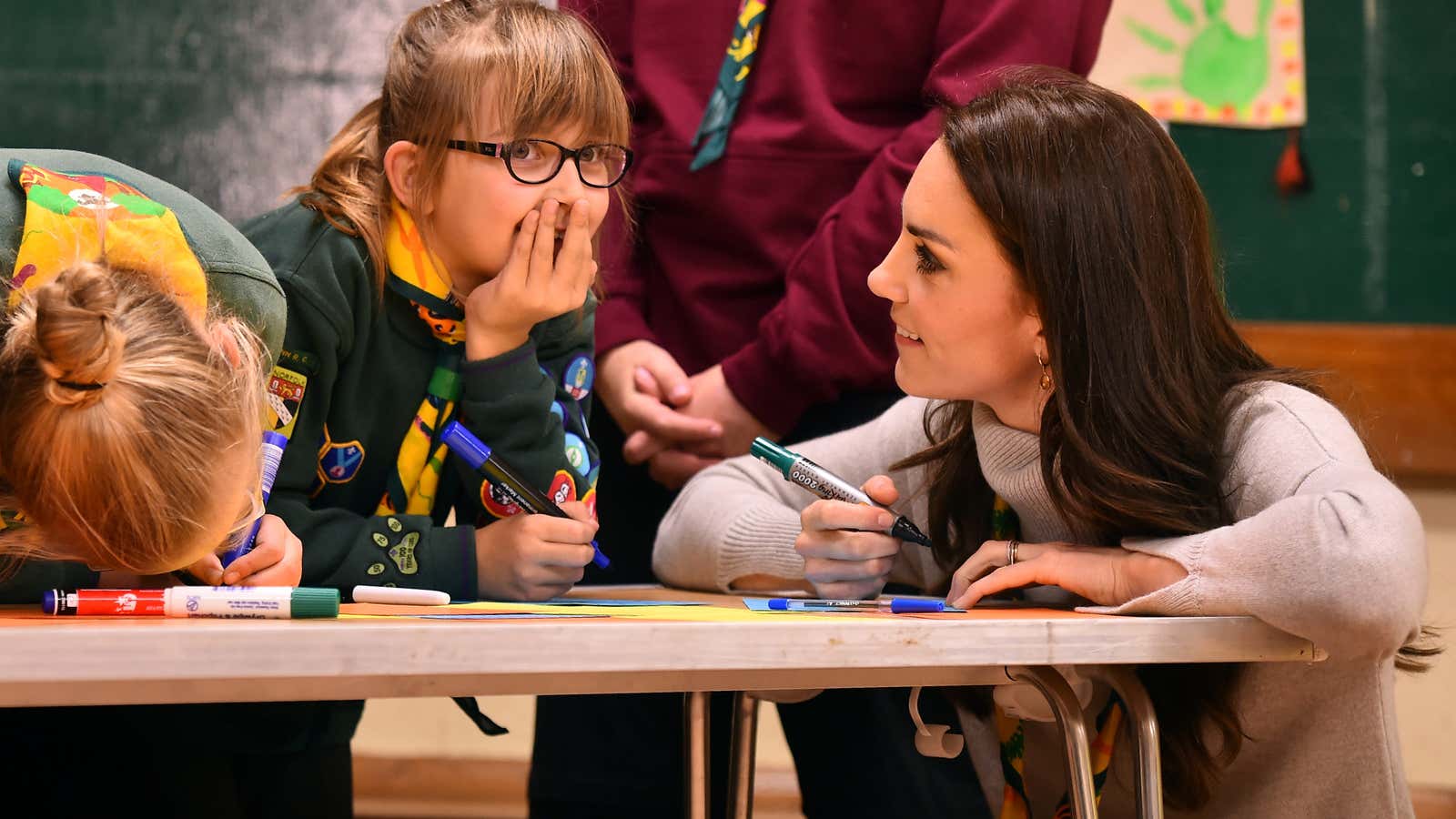 Britain’s Catherine, Duchess of Cambridge, talks to cubs during a Cub Scout Pack meeting with cubs from the Kings Lynn District, in Kings Lynn, Britain, December 14, 2016, during an event to celebrate 100 years of Cubs. REUTERS/Ben Stansall/Pool – RC1FEF9C0730