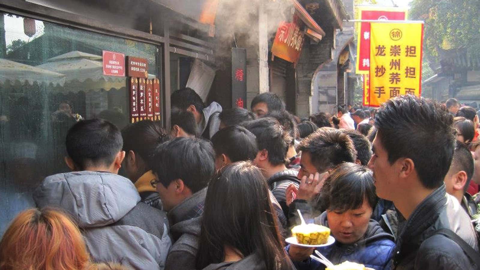Just trying to be part of the crowd at a food stall on Jinli Pedestrian Street in Chengdu, China.