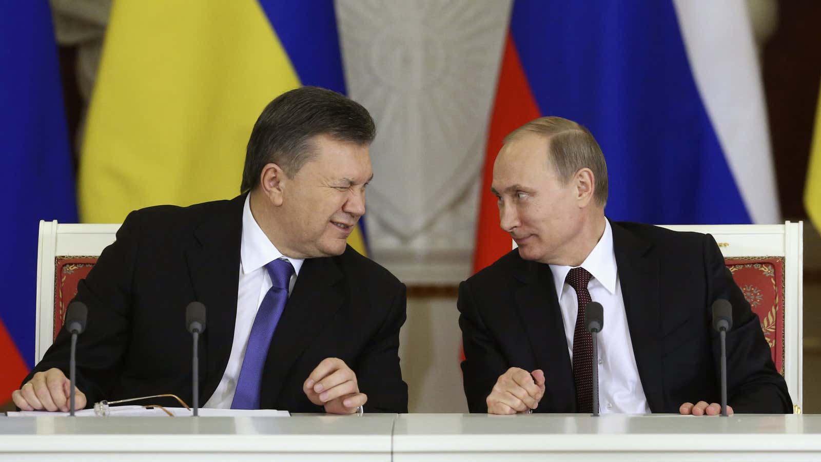 Ukrainian President Viktor Yanukovich (L) gives a wink to his Russian counterpart Vladimir Putin during a signing ceremony after a meeting of the Russian-Ukrainian Interstate…
