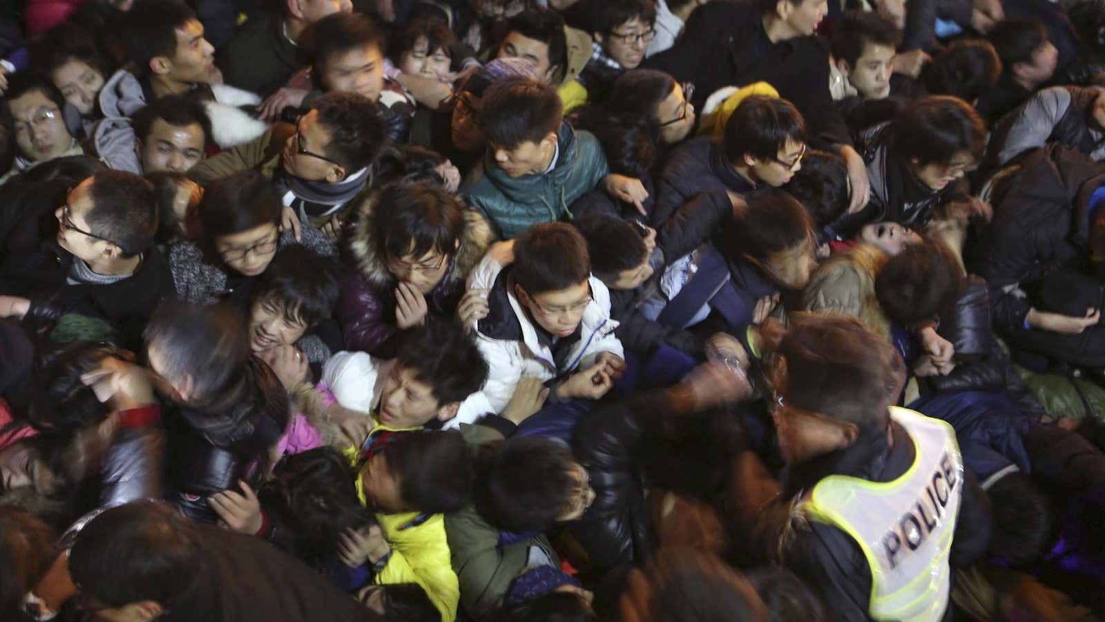 A view of a stampede is seen during the New Year’s celebration on the Bund, a waterfront area in central Shanghai on Dec. 31st.