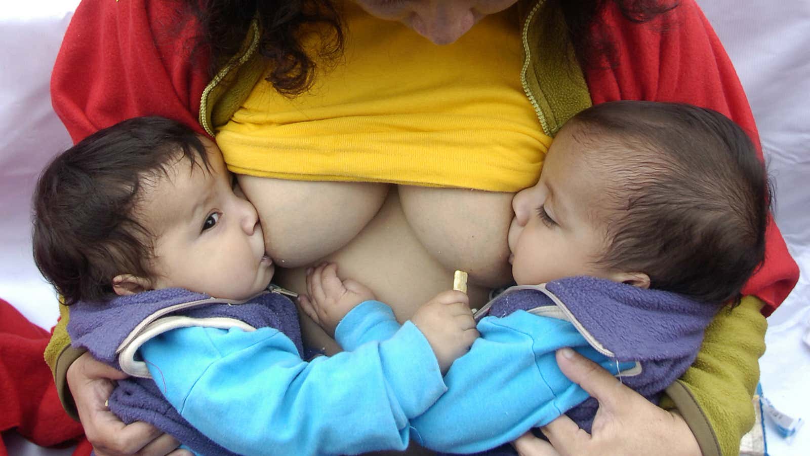 A breastfeeding mother in Peru. We need to ensure they get the benefits of her milk even if she is away.