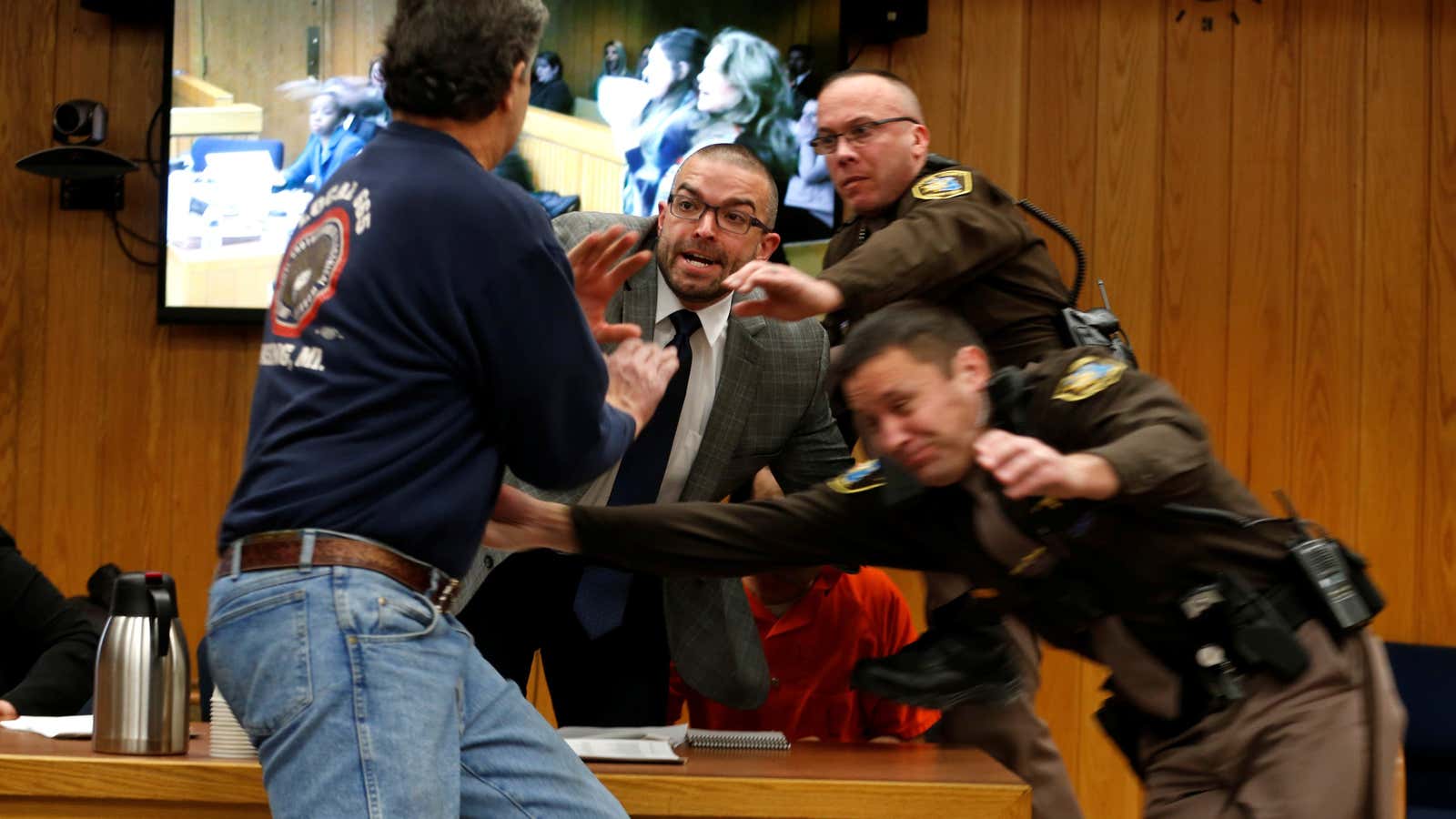 The father of three of Nassar’s numerous victims lunged at the disgraced former sports doctor in court on Friday.