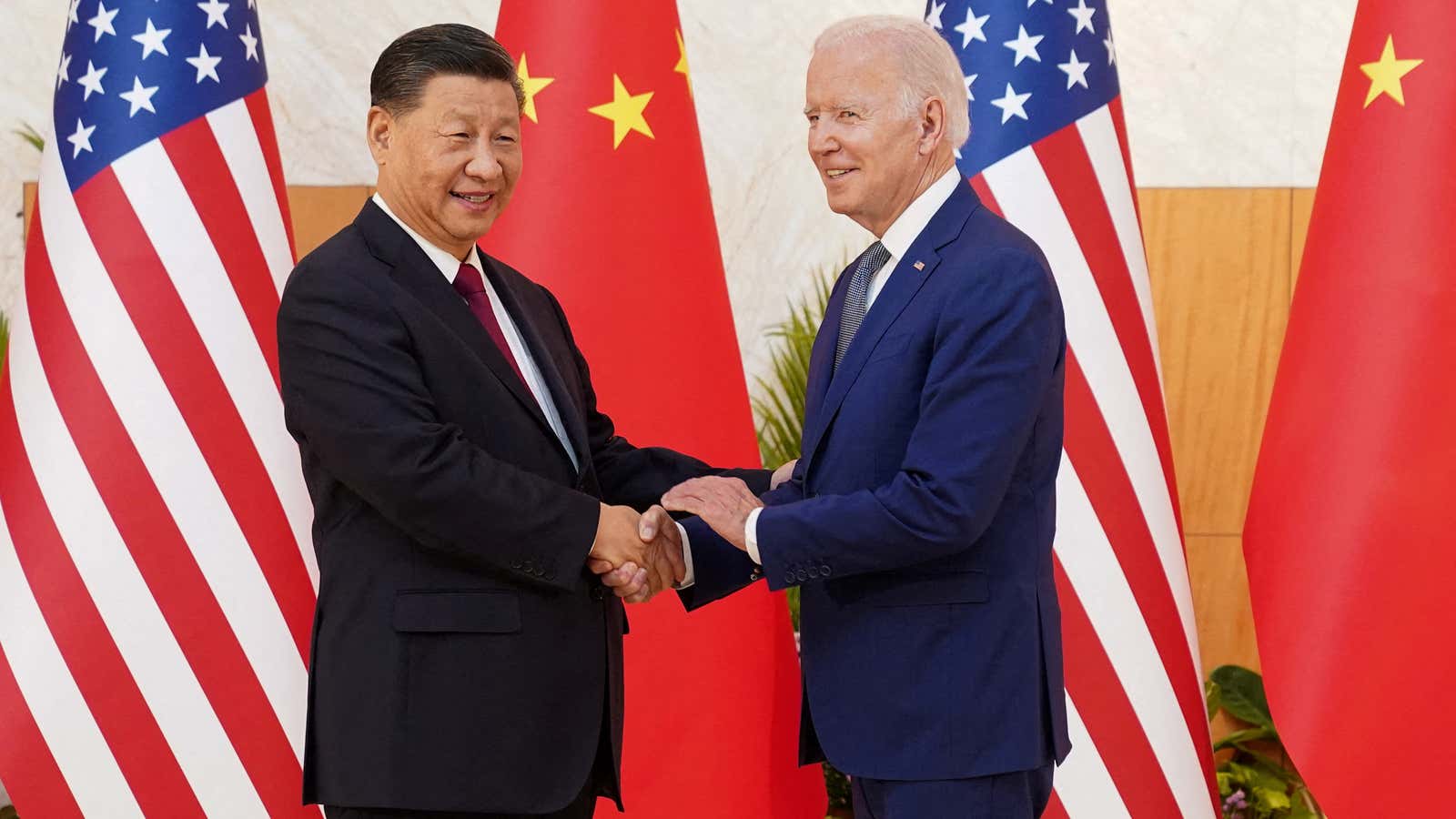 US president Joe Biden shakes hands with Chinese president Xi Jinping.