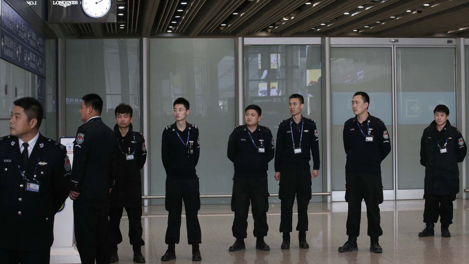 Security personnel at Beijing airport.