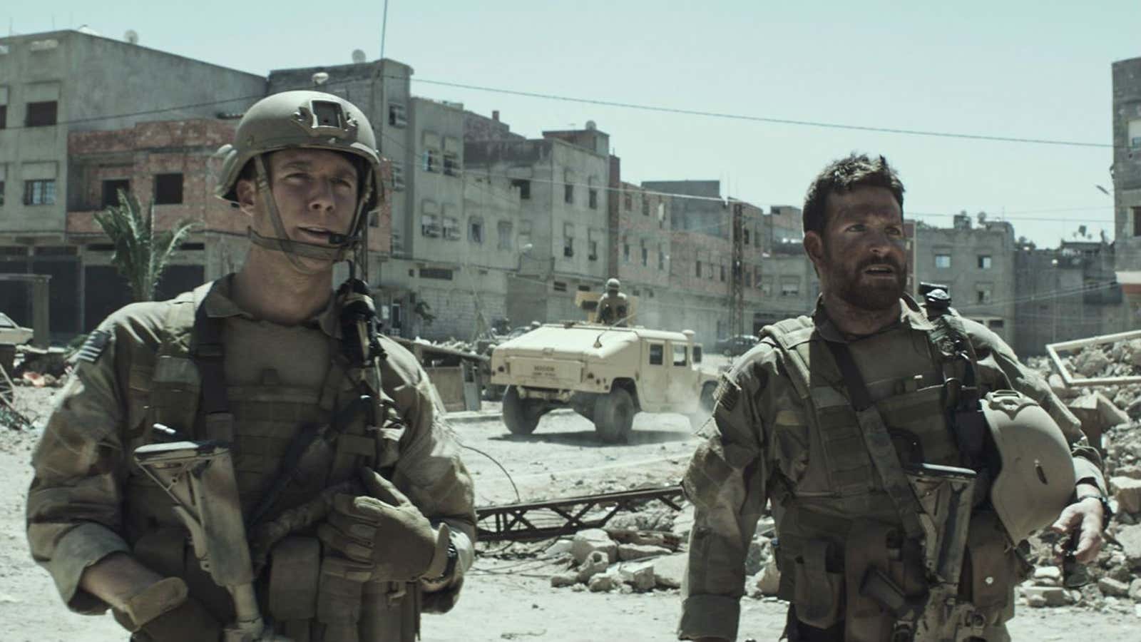Bradley Cooper (right) in “American Sniper.”