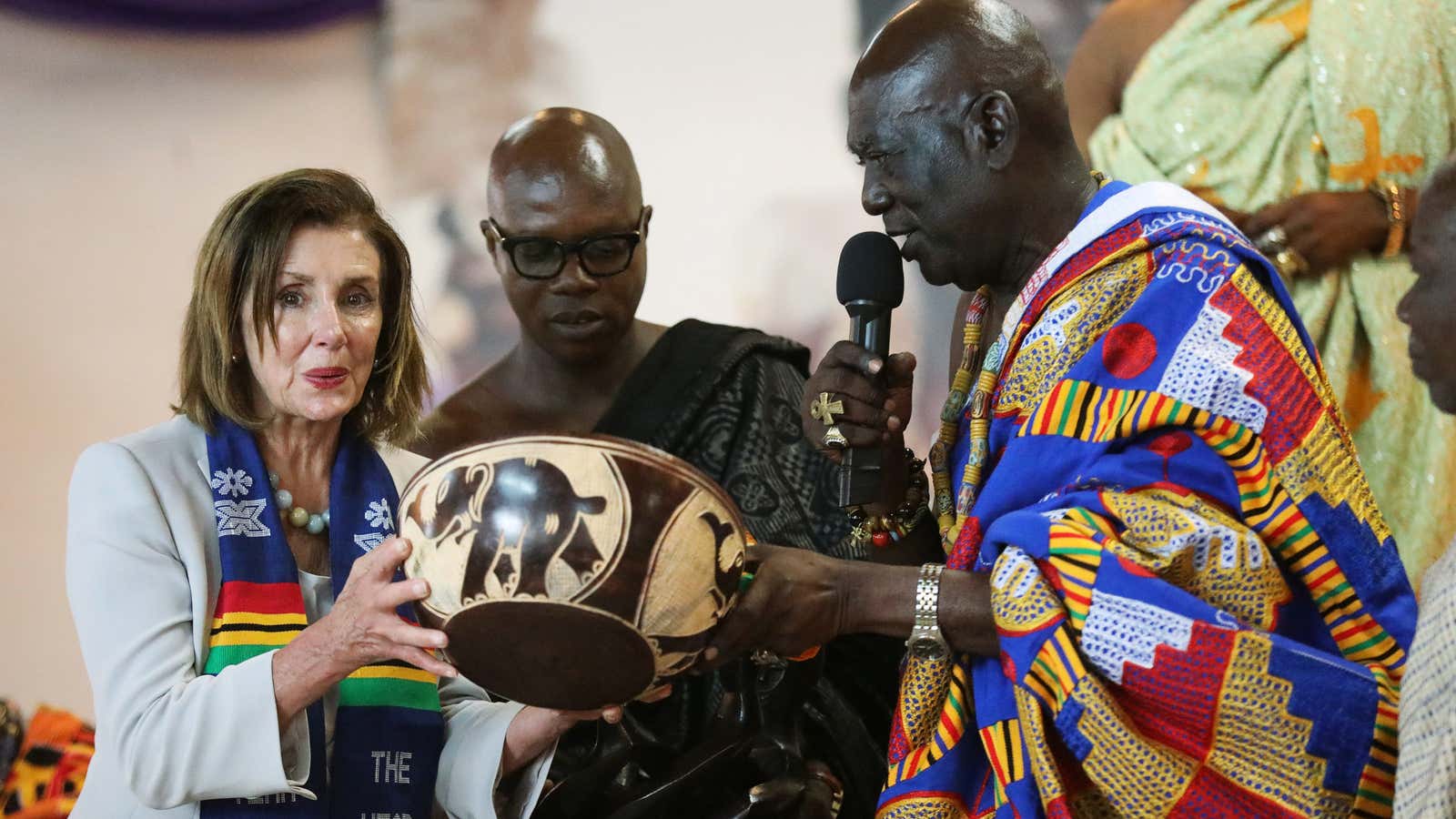 US speaker of the House Nancy Pelosi receives a gift from Paramount Chief of Cape Coast traditional area, Osabarima Kwesi Atta II,  July 30, 2019.