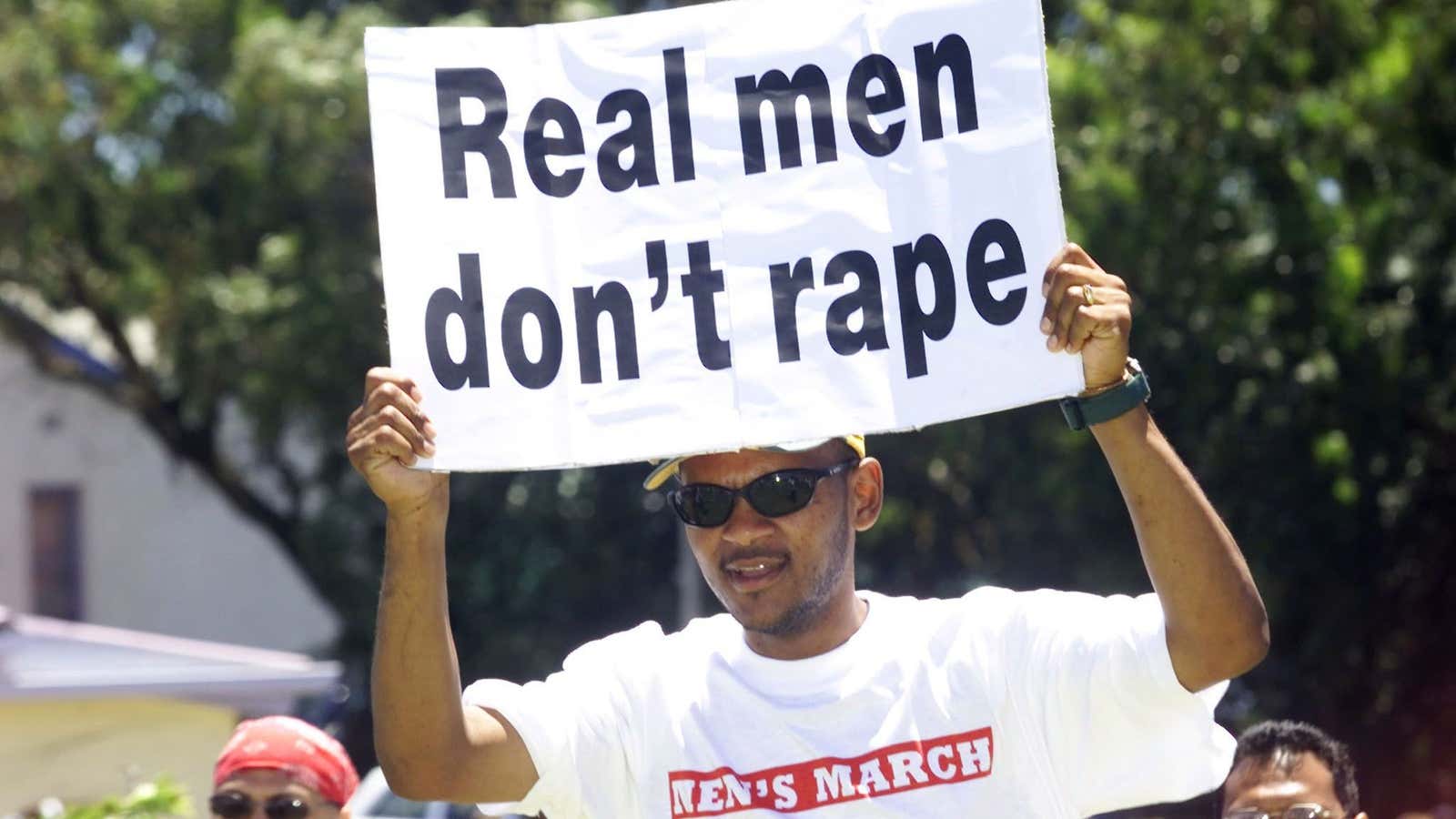 Protesters carry placards as they join the annual Mens March against
violence towards women and children, November 25, 2001. Several
thousand men took part in the march to show their frustration at the
country’s extremely high levels of abuse. Tensions around the issue
have been enflamed by several recent incidents of child rape, including
the brutal gang rape of a nine month old baby.
REUTERS
MH/FMS – RP2DRIQQZDAA