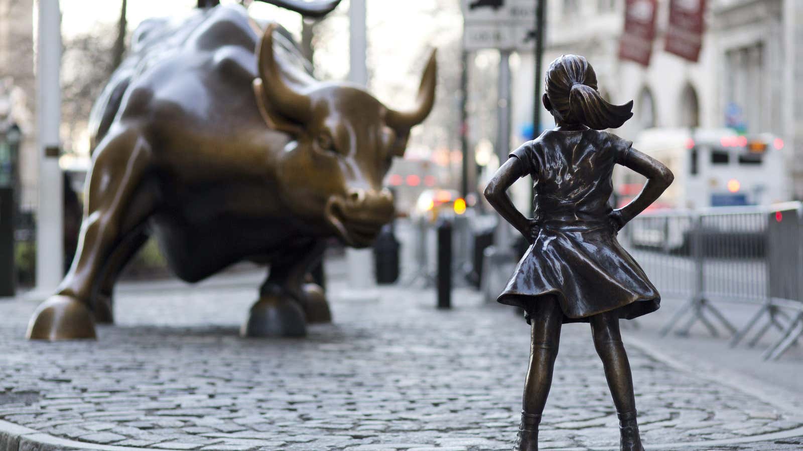 In this March 22, 2017 photo, the Charging Bull and Fearless Girl statues are sit on Lower Broadway in New York. Since 1989 the bronze…