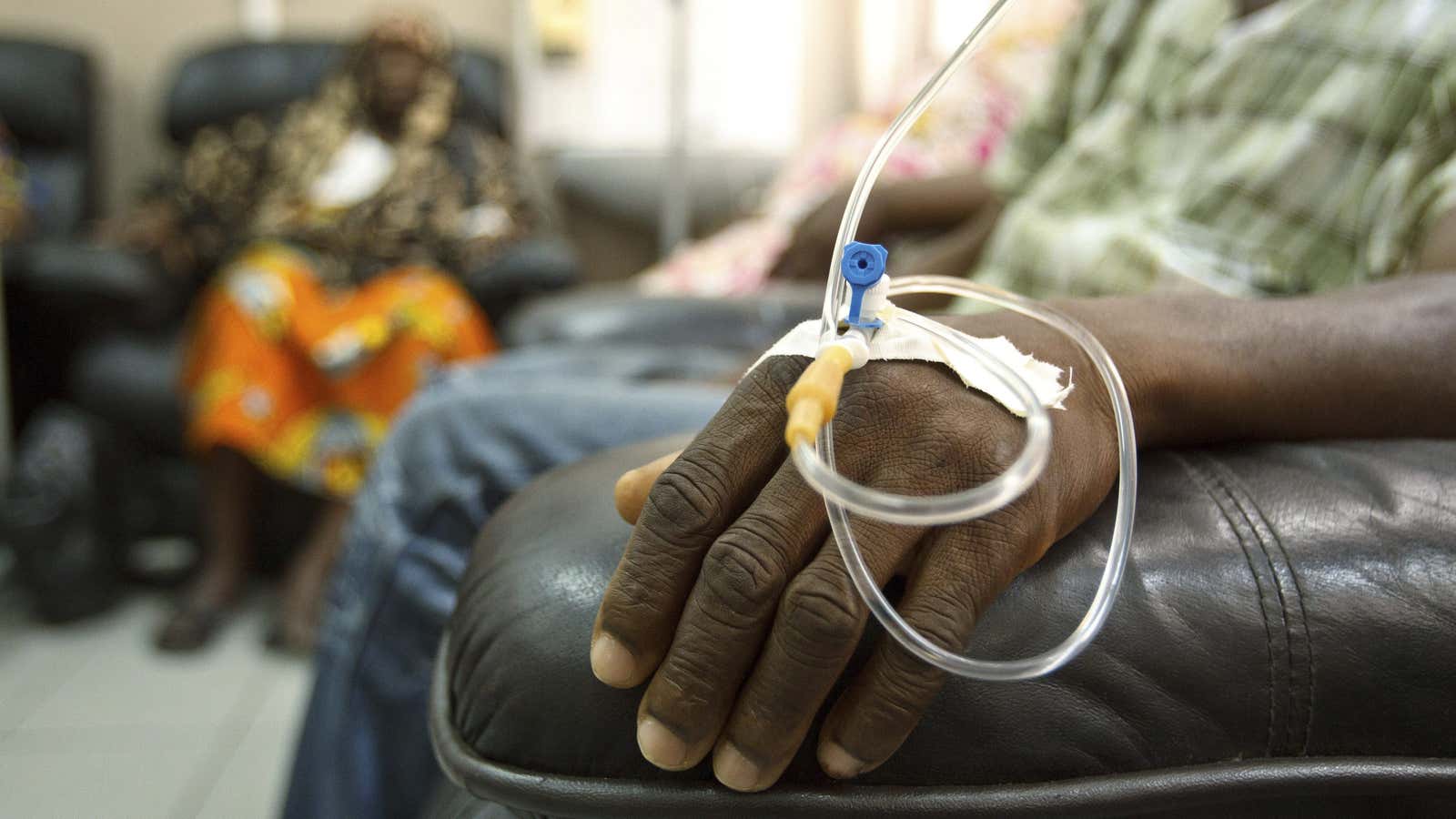 Cancer patients sit in a chemotherapy ward while receiving treatment in Accra, Ghana.