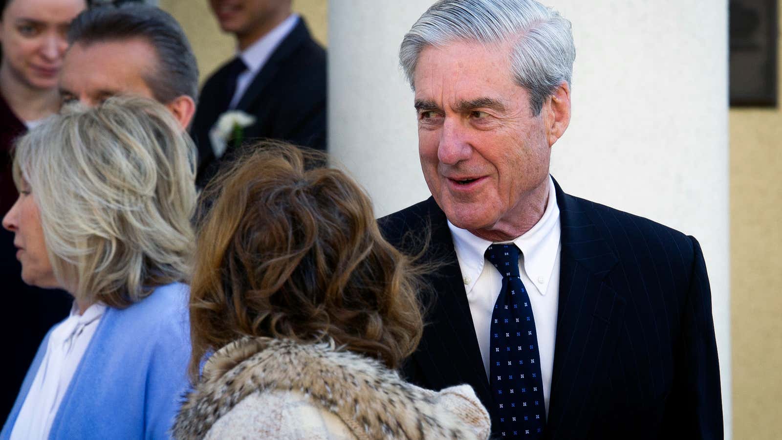 Mueller flashes a smile.