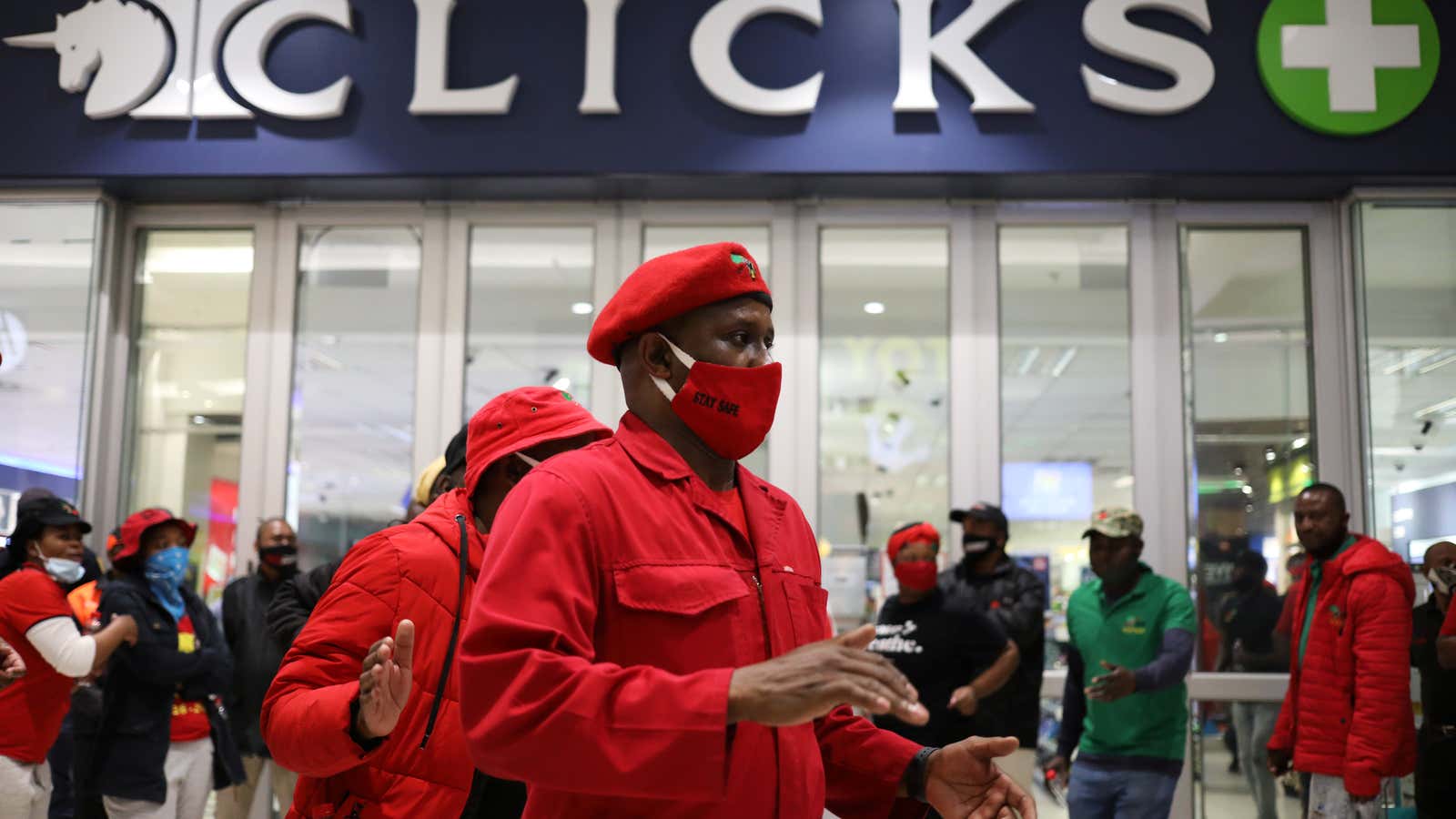 Members of the opposition Economic Freedom Front (EFF) protest outside a branch of drug store chain Clicks in Johannesburg, South Africa, Sept. 7.