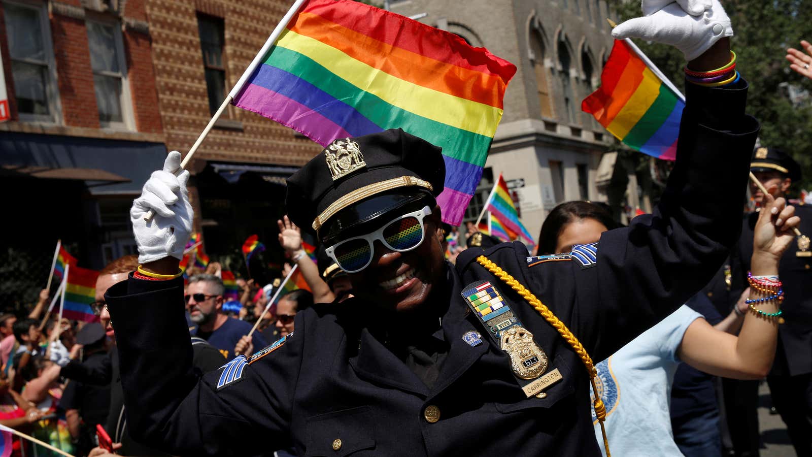A New York City Police officer (NYPD) marches in the annual NYC Pride parade in New York City, New York, U.S., June 26, 2016.