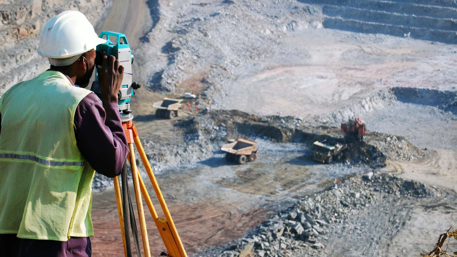 A Zambian surveyor sees an open-pit copper mine, and a world of possibility. Ah yes, possibility.