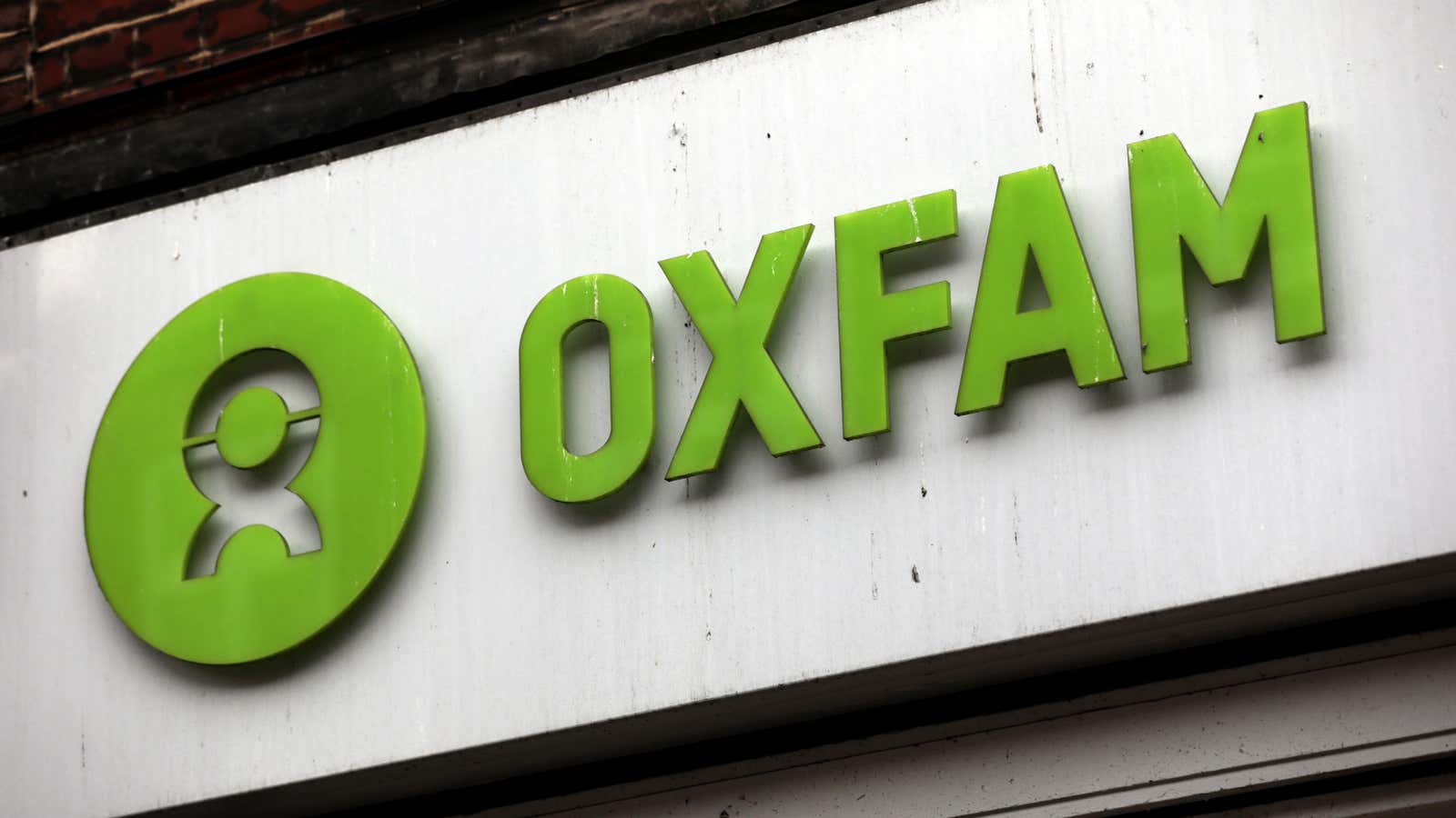 A sign is seen above a branch of Oxfam, in central London, Britain February 13, 2018.