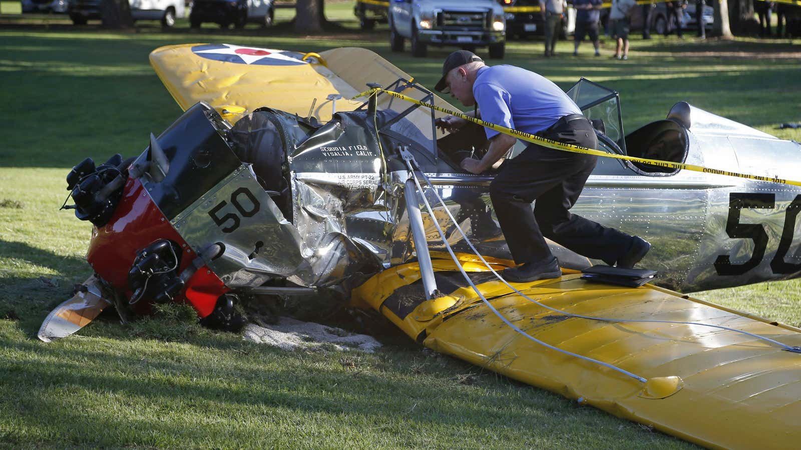 An airplane sits on the ground after crash landing at Penmar Golf Course in Venice, Los Angeles.